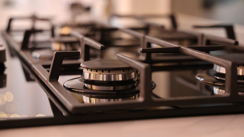 A gas cooker hob in a kitchen